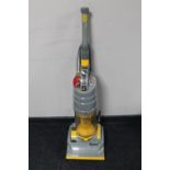 A Dyson DC 1 upright vacuum cleaner