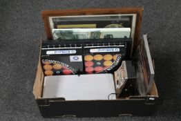 A box of two sets of billiard balls, miniature slot machine,