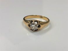 An 18ct gold old cut solitaire diamond ring, approximately 0.