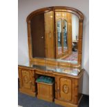 An oriental style parcel gilt kneehole mirror-back dressing table and stool