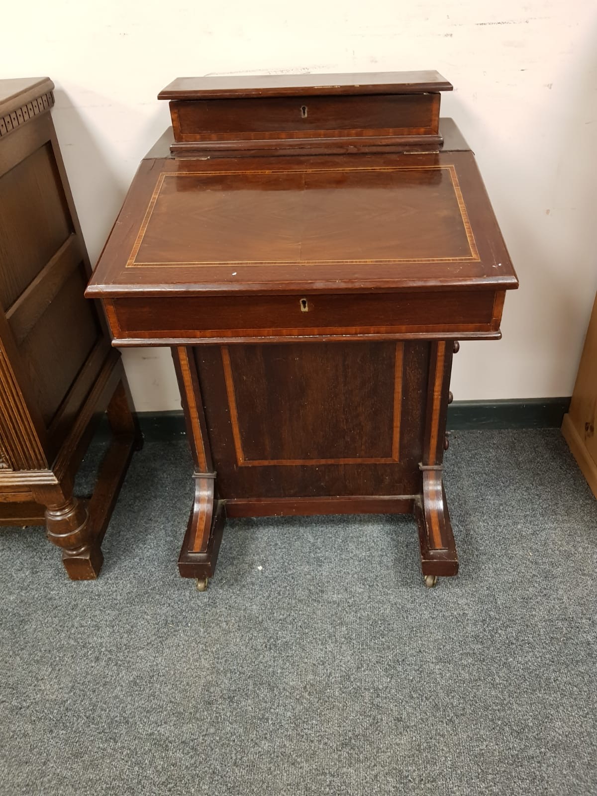 A Victorian inlaid mahogany Davenport,