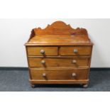 A Victorian pine four drawer chest