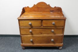 A Victorian pine four drawer chest