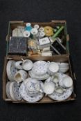 Two boxes containing an English blue and white pottery tea and dinner service,