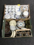 Two boxes of Japanese pottery plates, sake cups,