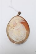 An antique 9ct rose gold cameo pendant depicting Leda and the Swan