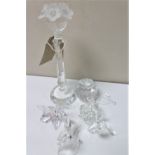 A collection of five crystal ornaments including Swarovski apple and candlestick (a/f) together