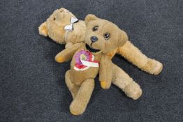 A 20th century mohair teddy bear and a Nookie bear with rosette
