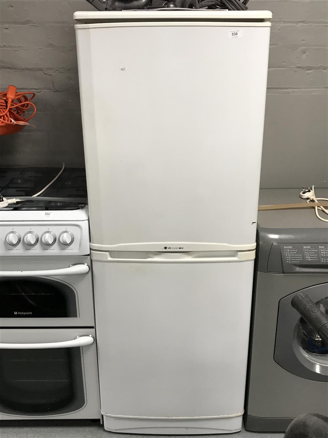 An LG upright fridge freezer