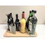 A tray containing eleven assorted bottles of alcohol including Madeira, Graham's Port, vermouth etc,