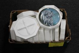 A box containing fourteen boxed collector's plates by The Franklin Mint and Royal Doulton