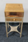 An antique pine occasional table fitted a drawer