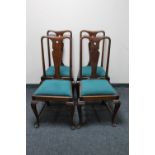 A set of four mahogany Queen Anne style dining chairs