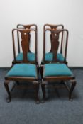A set of four mahogany Queen Anne style dining chairs
