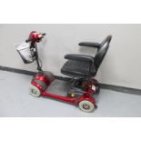 A Mobility Direct mobility scooter with keys and charging lead