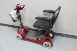 A Mobility Direct mobility scooter with keys and charging lead