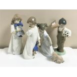 Four Nao figures; boy with football,