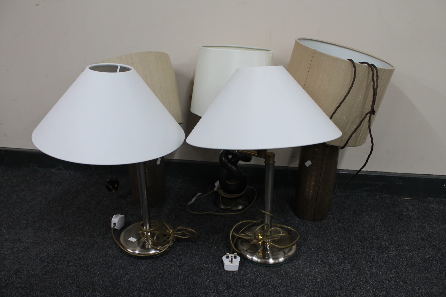 Two pairs of contemporary table lamps together with another table lamp