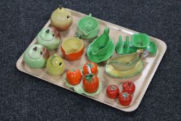 A tray of two three-piece tomato pottery cruet sets together with nine pieces of Carlton ware and