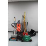 A quantity of gardening equipment to include a Qualcast electric lawn mower with lead,