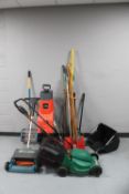 A quantity of gardening equipment to include a Qualcast electric lawn mower with lead,