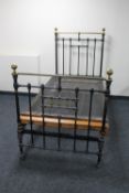 A Victorian cast iron and brass 3' bed frame with box spring