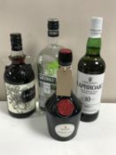 Four bottles of alcohol; a 1l bottle Greenall's Dry Gin, 70cl bottle of The Kraken Black Spiced Rum,