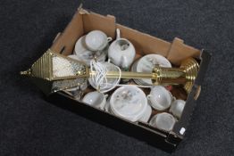 A box containing Japanese tea service, beer stein,