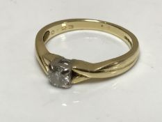 An 18ct gold diamond solitaire ring, approximately 0.2ct, size N 1/2.