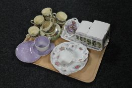 A tray containing a five piece Royal Albert Tranquility tea for one, two boxed Lilliput cottages,