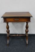 A late 19th century inlaid mahogany work table