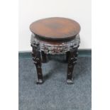 A 20th century carved Chinese plant stand