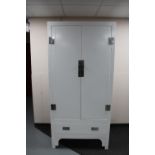A contemporary white Chinese style double door wardrobe fitted a drawer