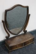A Victorian mahogany shield toilet mirror fitted two drawers