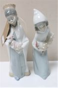 Two Lladro figures of a boy with crown and girl carrying a hen