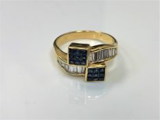 An 18ct gold sapphire and diamond ring, set with approximately 1.7 carats of diamonds, 7.