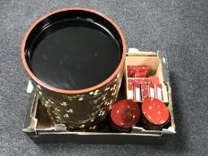 A box containing Japanese lacquered rice and sushi bowls,