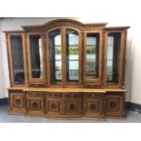 An impressive oriental style high gloss glazed, breakfront bookcase,