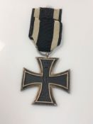 A silver German Iron Cross