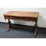 A Victorian mahogany side table with under stretcher