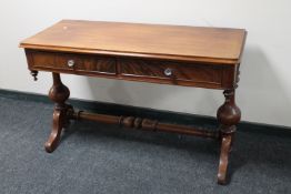 A Victorian mahogany side table with under stretcher