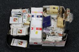 A tray of a large quantity of assorted cigarette and cigar cards and boxes