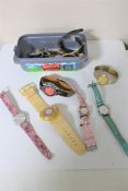 A vintage 'Pisces' car badge and sixteen assorted lady's and gent's wristwatches including two