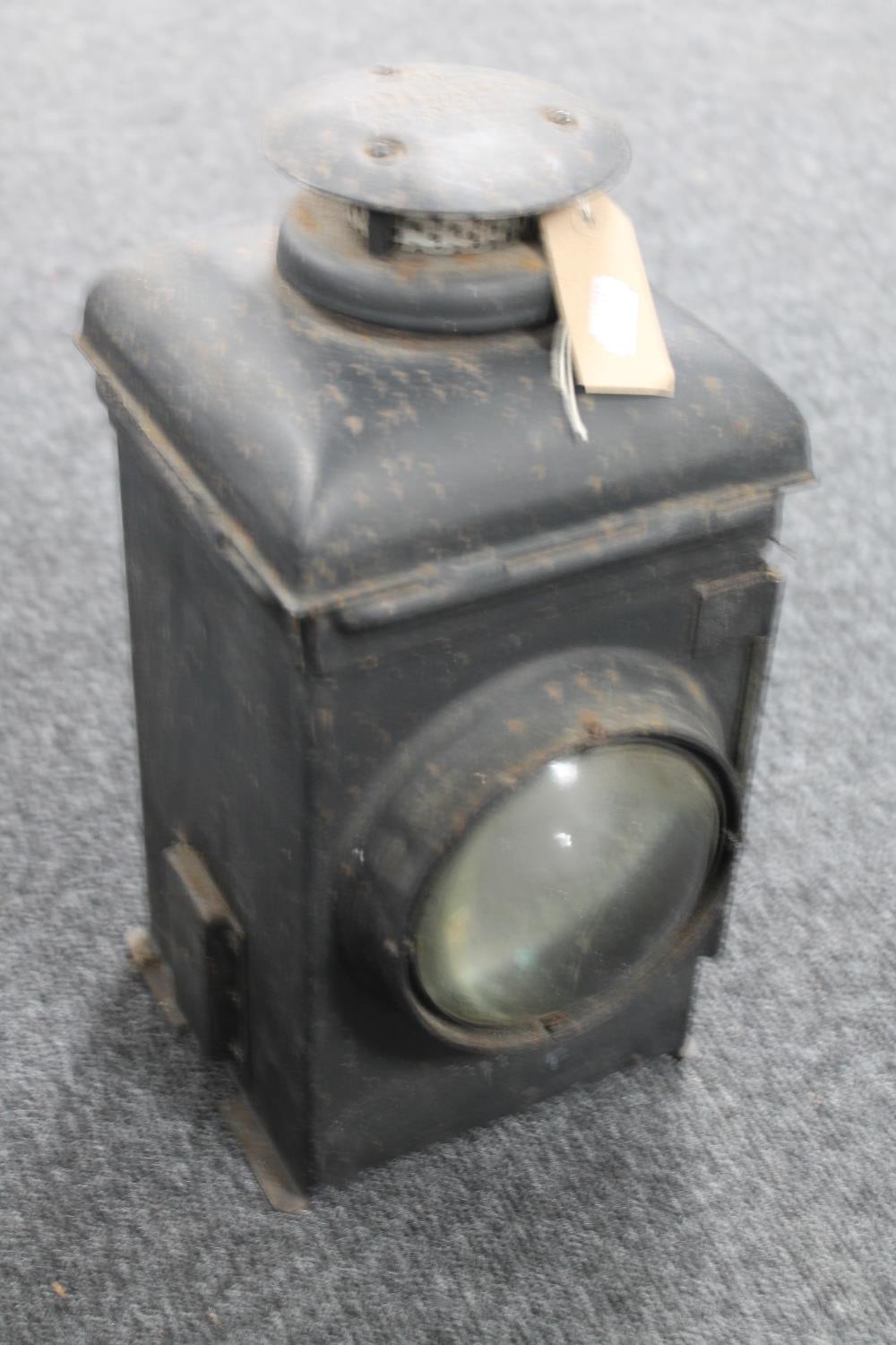 A vintage The Adlake railway lamp with clear glass lens