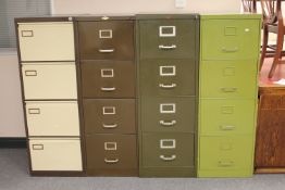 Four metal four drawer filing cabinets