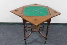 A Victorian mahogany envelope card table