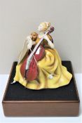 A Royal Doulton figure, Cello HN 2331, modelled by Peggy Davies, limited edition number 425,