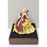 A Royal Doulton figure, Cello HN 2331, modelled by Peggy Davies, limited edition number 425,