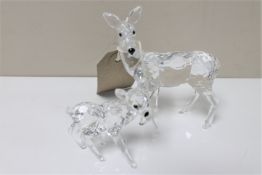 Two (Swarovski?) crystal figures of a doe with fawn