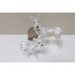 Two (Swarovski?) crystal figures of a doe with fawn